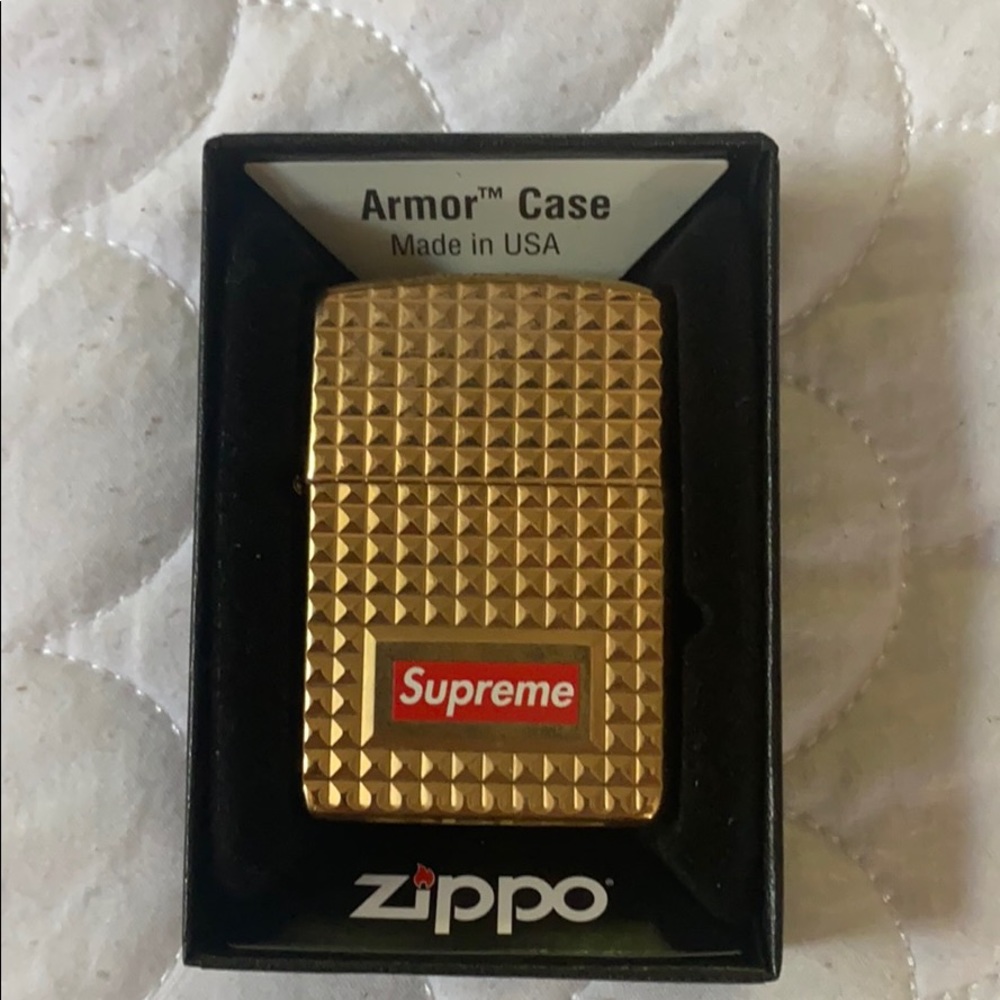 Supreme gold diamond cut zippo